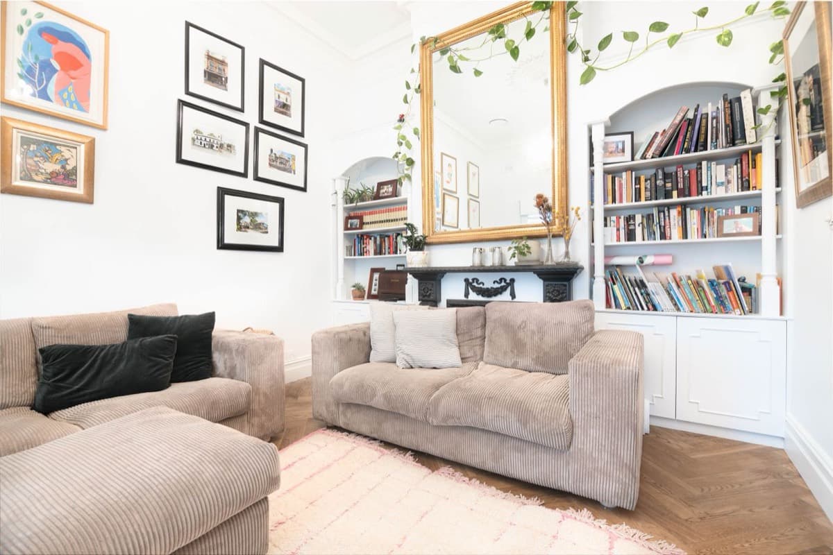 Furnished London living room with sofas, soft furnishings and considered styling
